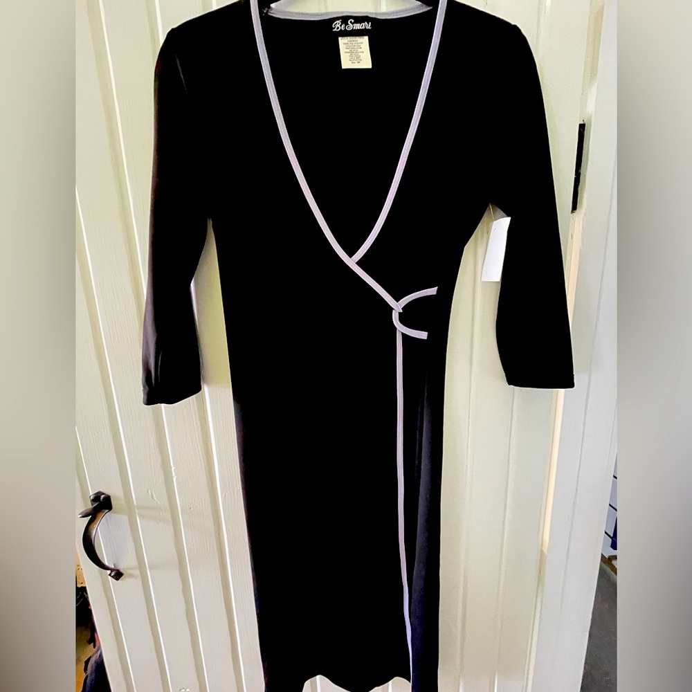 Be Smart wrap like dress. Blacked, trimmed in lilac.Size 3/4- worn once 🖤💜